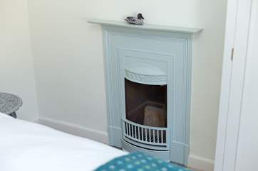 Another pretty ornamental original fireplace.