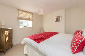 This is the third bedroom overlooking the garden at the back of the cottage. This bedroom can be made up as twins at your request.