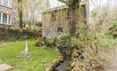 A pretty stream meanders in front of The Granary. The owners' home can be seen to the left. - Thumbnail Image