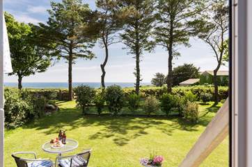 There is plenty of space to the front of the hut, perfect for enjoying a G&T whilst taking in the view - bliss!