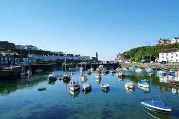 Porthleven's picturesque harbour with its array of restaurants, pubs and shops is a short drive away.