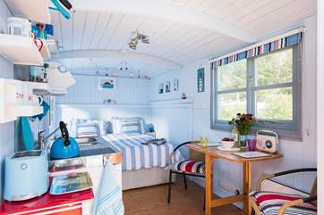 This deligjhtful hut is surprisingly spacious inside with room at either side of the king-sized bed.