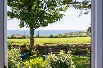 This is your view across the field in front of the huts over to Praa Sands and the sea beyond when the farmer plants his low level crops.