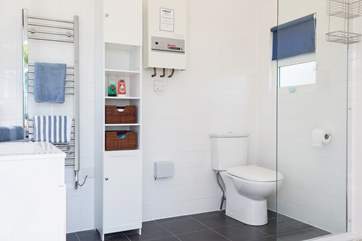 The spacious shower-room is located in your very own 'beach hut' behind Mr Blue Sky. It even has a heated towel rail and hair-dryer too.