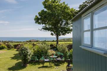 The view is rather special (please note, the barbecue and chiminea have been replaced with a fire-pit barbecue).