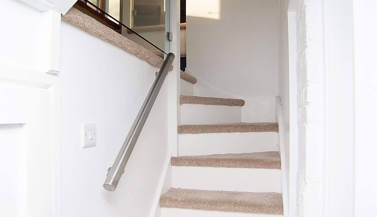 The stairs down to the lower ground floor.