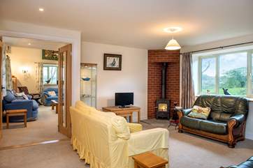 The second sitting-room leads through to the main sitting-room.
