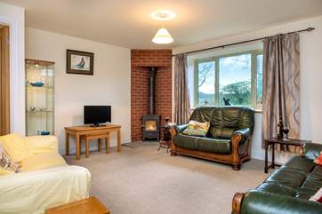 There is a cosy wood-burner in the second sitting-room too.