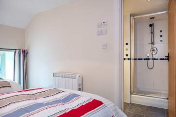 This bedroom has an en suite shower-room (Bedroom 4).