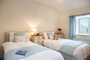 This cosy bedroom has twin beds (Bedroom 3).