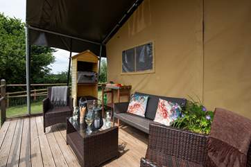 There is a gas fridge and a gas combination oven out on the deck, as well as a table for food prep - perfect for al fresco cooking and dining.