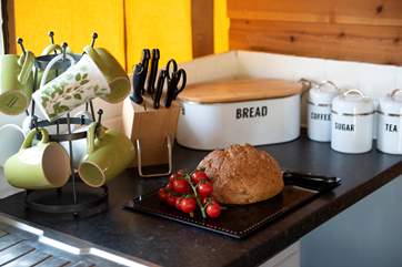 The kitchen is well-equipped, with all you could need for your luxury glamping holiday.