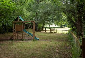 There is an enclosed play area in the lower meadow.
