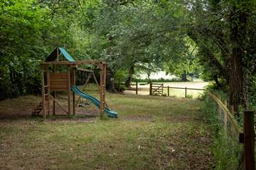 There is an enclosed play area in the lower meadow.