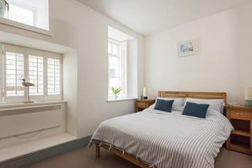 The comfortable double bedroom.