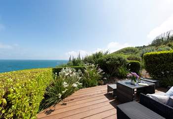 Relax over a morning coffee and just take in that expansive sea view. 