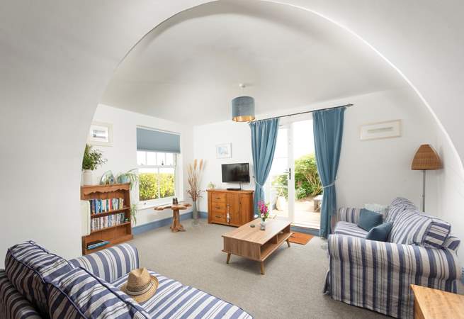 French doors open out onto the private terrace.