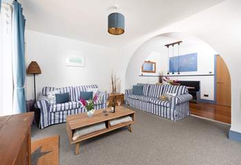 This lovely apartment in coastal hues is light and airy.