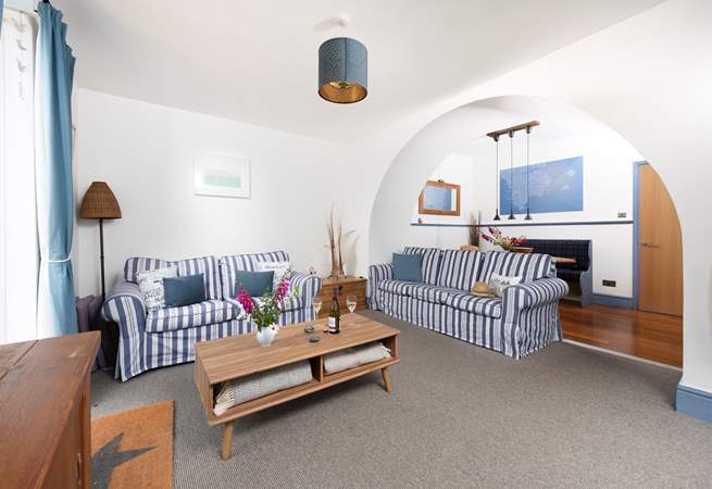 This lovely apartment in coastal hues is light and airy.