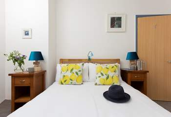 The comfortable light-filled double bedroom.