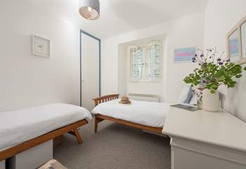 The twin bedroom with two 3' single beds.
