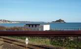 Looking down to the railway which runs between the house and the beach. - Thumbnail Image