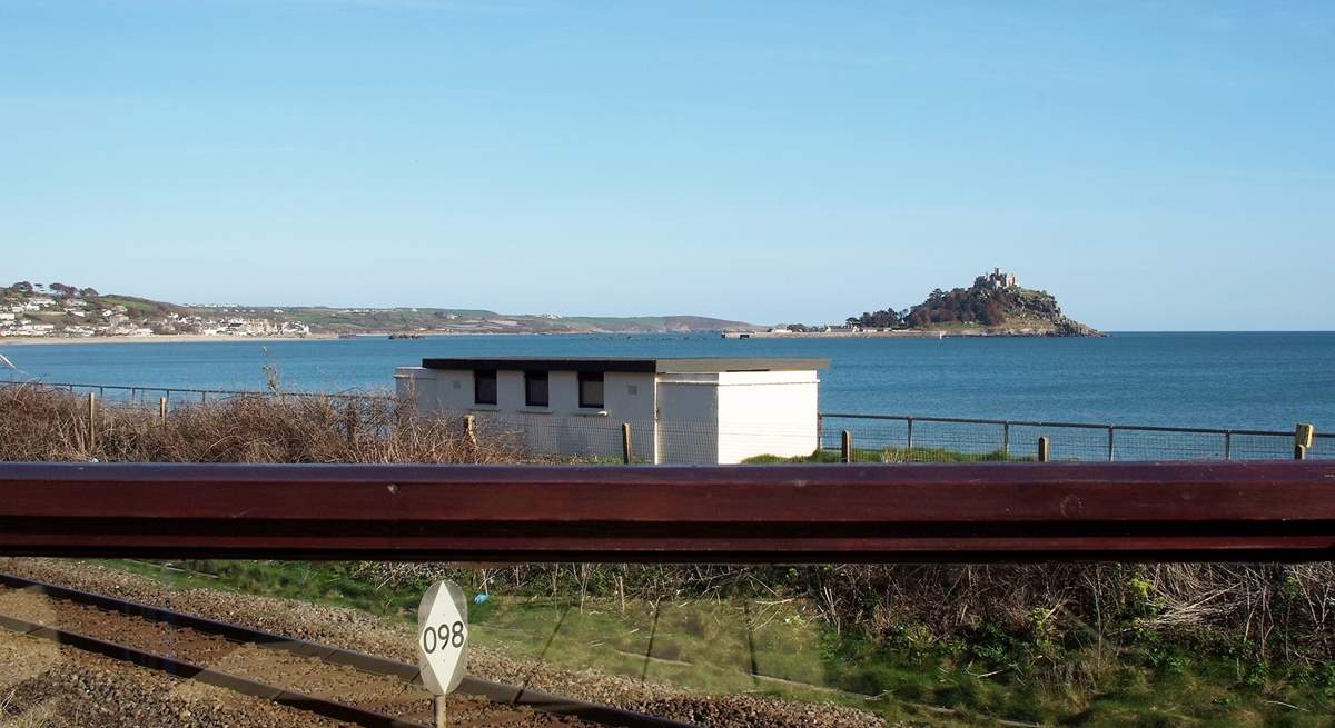 Looking down to the railway which runs between the house and the beach.