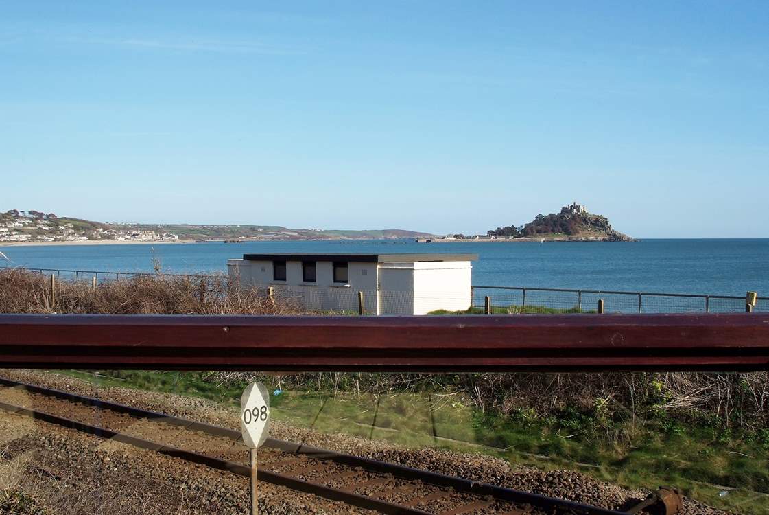 Looking down to the railway which runs between the house and the beach.