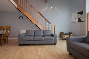 Stairs lead up to the second floor bedroom.
