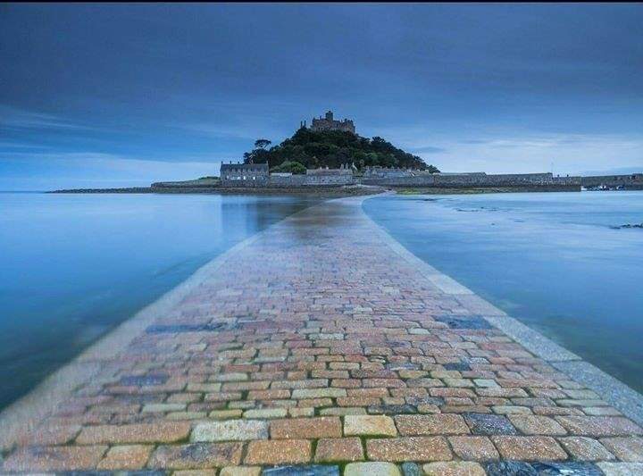 Iconic St Michael's Mount, access either on foot along the causeway or by passenger ferry when the tide is in.