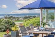 Dine in the fresh air and enjoy the views across to St Michael's Mount.