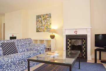 The sitting-room is beautifully furnished.