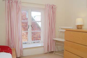 The big window in Bedroom 3 lets in plenty of light.
