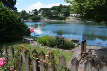 The lower garden and patio leads out to the jetty.