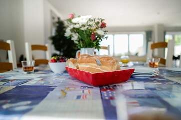 The large dining-table offers a formal area for the family to come together.