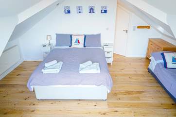 The double bedroom (Bedroom 2) has an en suite bathroom. Take care on the low ceilings as you enter the bedroom or bathroom.