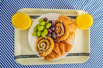 Breakfast in bed whilst soaking in the view.