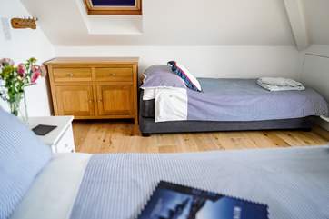 Bedroom 2 on the top floor has the option of a three foot bed. If not required, this makes for a wonderful chill out area. Please be careful of the sloping ceiling.