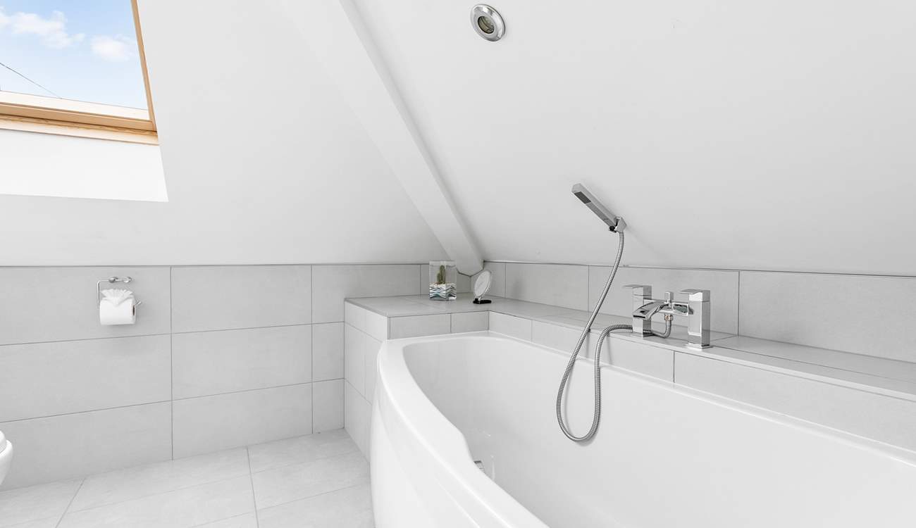 The en suite bathroom to Bedroom 2 - take care on the low lintel and reduced head room.