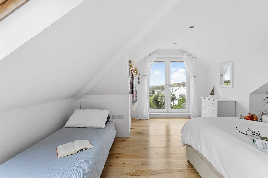 Bedroom 2 on the top floor has the option of a three foot bed. If not required, this makes for a wonderful chill out area.  Please be careful of the sloping ceiling.