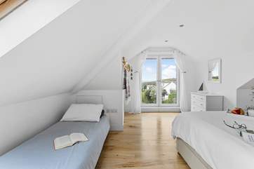 Bedroom 2 on the top floor has the option of a three foot bed. If not required, this makes for a wonderful chill out area. Please be careful of the sloping ceiling.