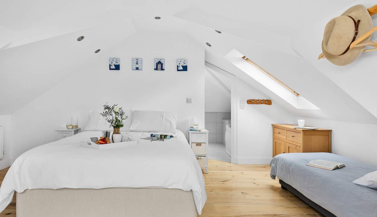 The double bedroom (Bedroom 2) has an en suite bathroom. Take care on the low ceilings as you enter the bedroom or bathroom.