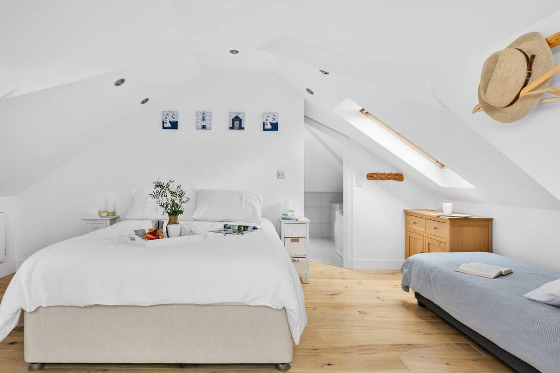 The double bedroom (Bedroom 2) has an en suite bathroom. Take care on the low ceilings as you enter the bedroom or bathroom.
