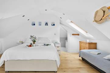 The double bedroom (Bedroom 2) has an en suite bathroom. Take care on the low ceilings as you enter the bedroom or bathroom.