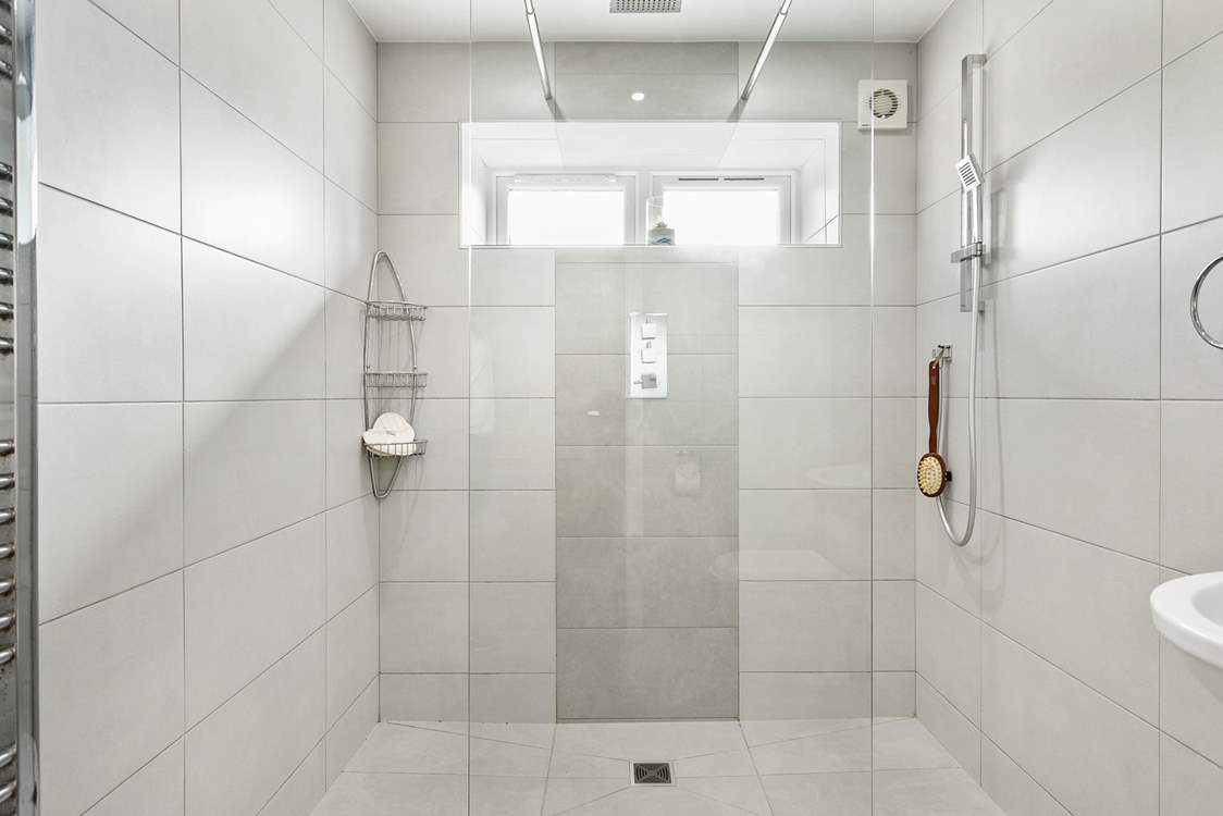 The wet-room on the lower ground floor sits between bedroom 3 and 4.