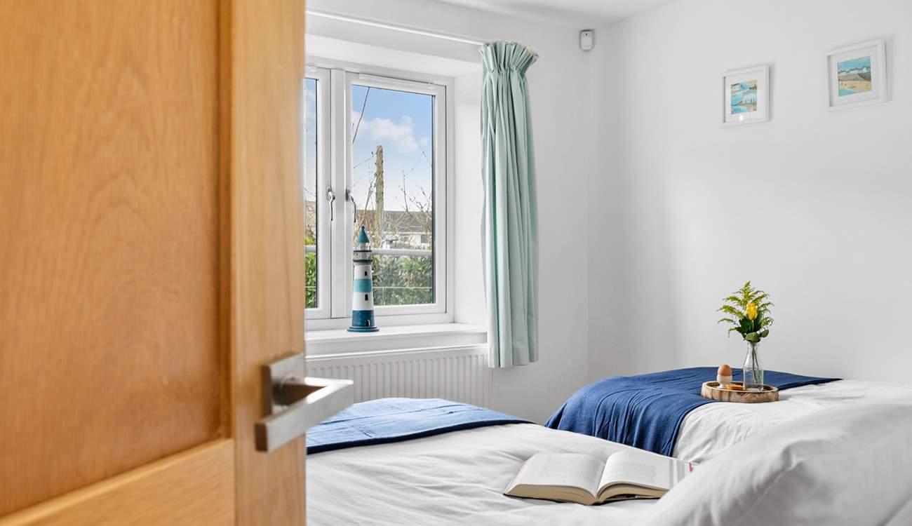 Bedroom 3 on the lower floor is a well positioned twin room,  close to the wet-room that is shared with Bedroom 4.