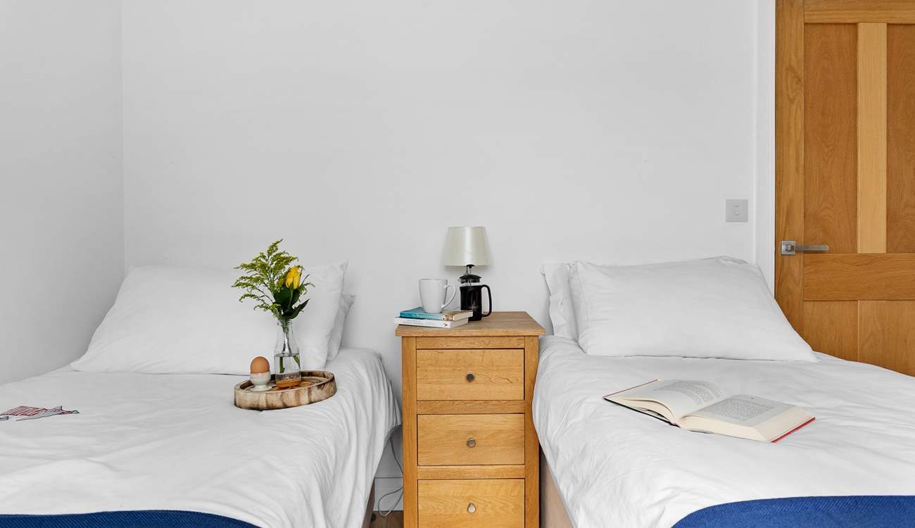 The third bedroom is flooded with natural light.