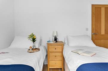 The third bedroom is flooded with natural light.