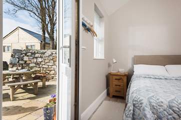 This calm ground floor bedroom has its own access from the front patio, ideal perhaps for anyone who finds the stairs a bit challenging.