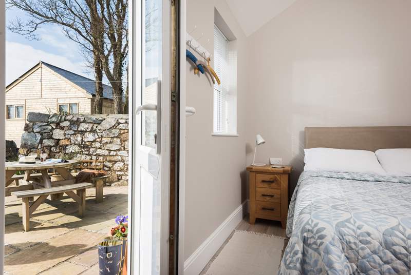 This calm ground floor bedroom has its own access from the front patio, ideal perhaps for anyone who finds the stairs a bit challenging.